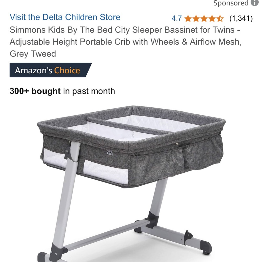 Gray Portable Crib with Adjustable Height and Wheels